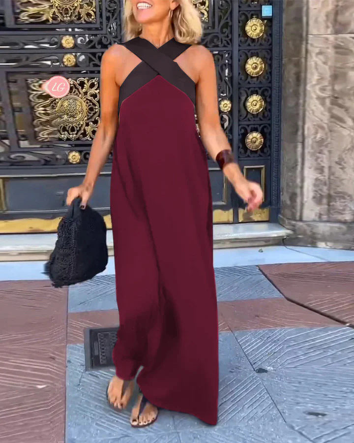 Women's elegant cross-neck maxi dress, flowing, comfortable, versatile for day or evening. A flattering choice.