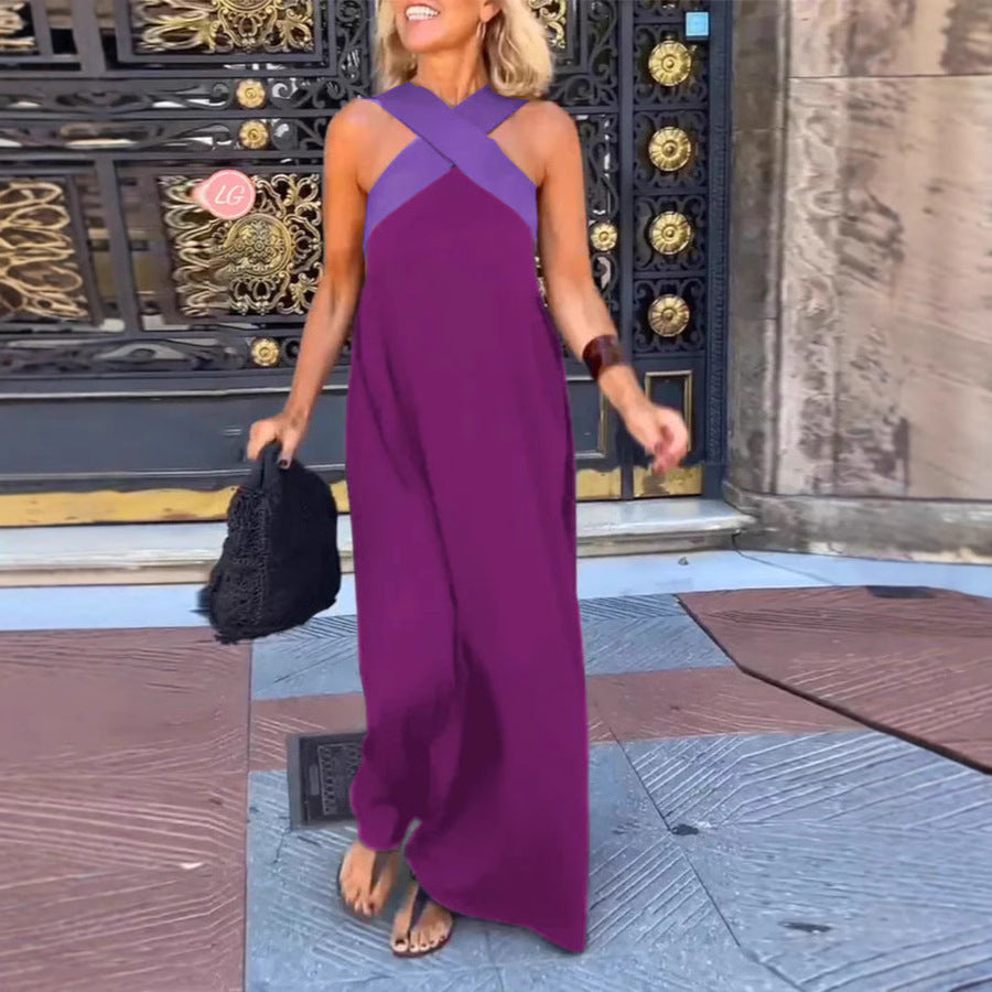Chic cross-neck maxi dress, ideal for summer evenings or comfortable day wear. Elegant & flattering.