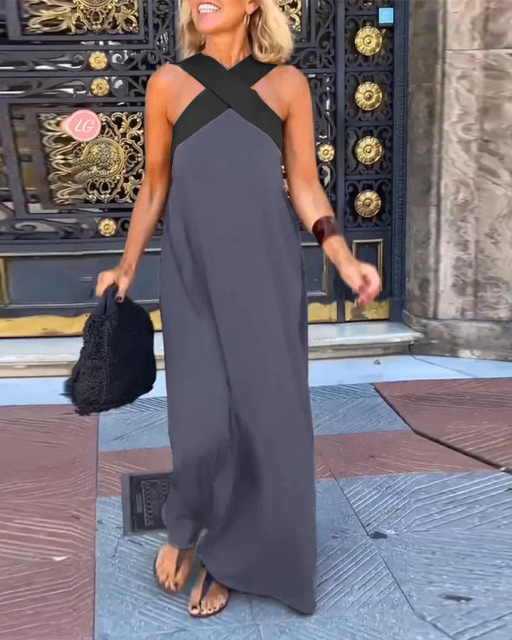 Comfortable women's flowing maxi dress, elegant cross-neck for all-day wear. Perfect summer staple.
