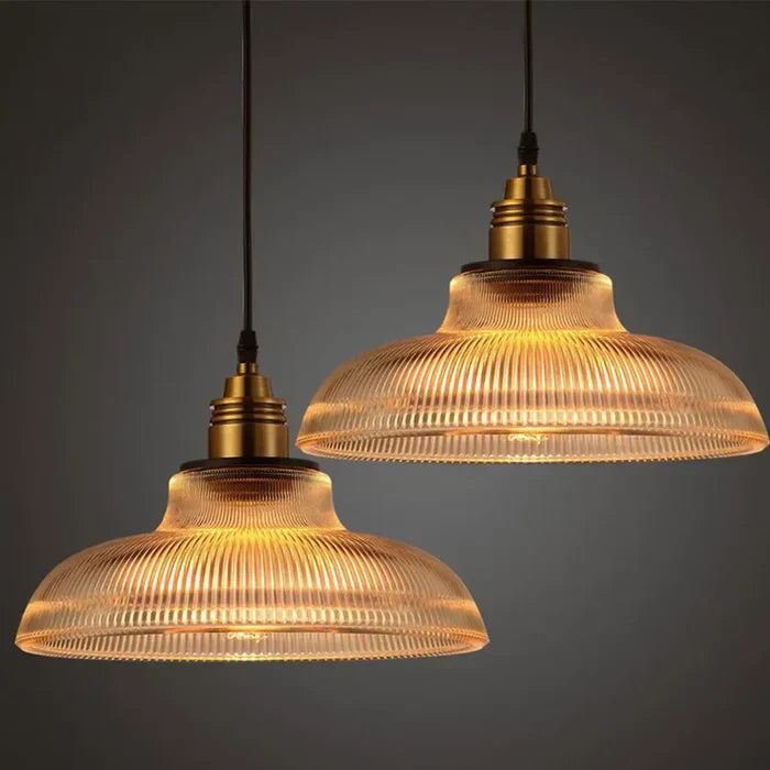 Elegant CrystalLoom glass pendant light with a warm white glow, perfect for modern home decor.