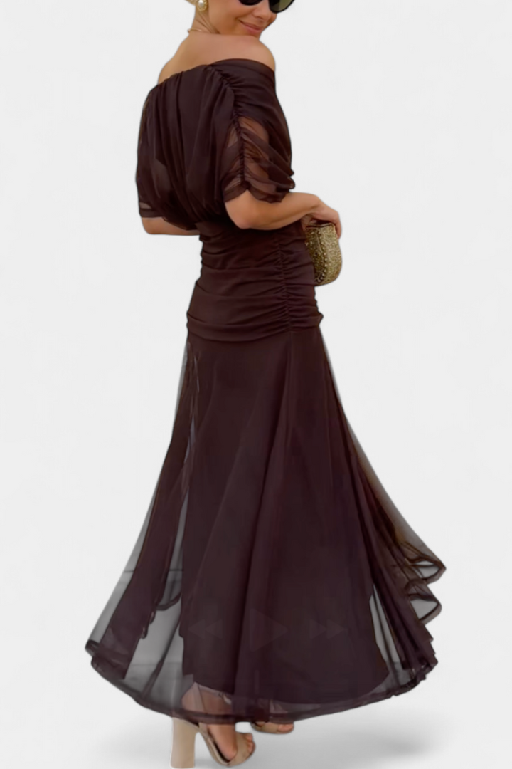 Elegant flowing off-shoulder floral maxi dress, highlighting women's silhouette, purple & pink summer.