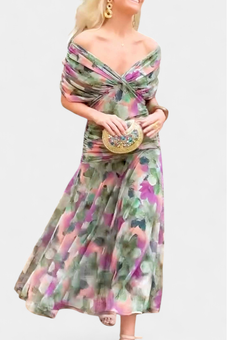 Detailed view of purple & pink floral print on elegant flowing off-shoulder maxi dress for women.