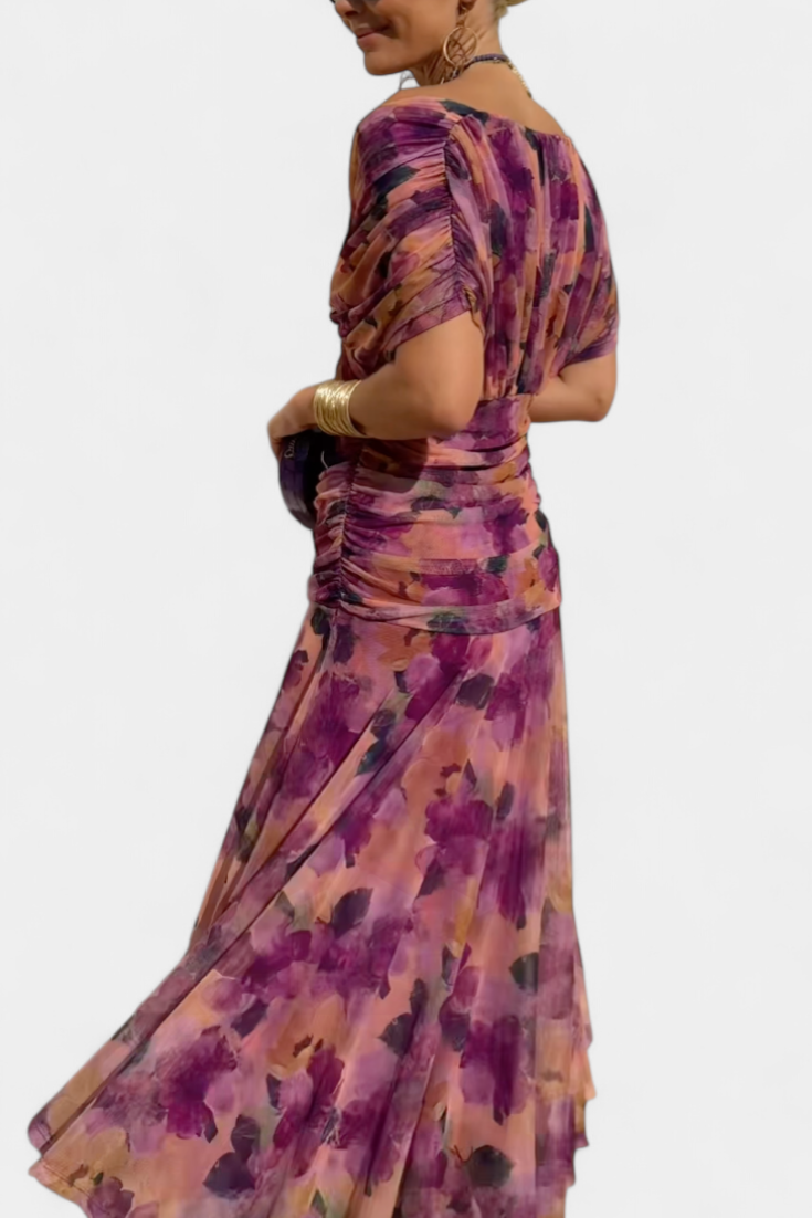 Women's elegant off-shoulder floral maxi dress, perfect flowing purple & pink summer occasion wear.