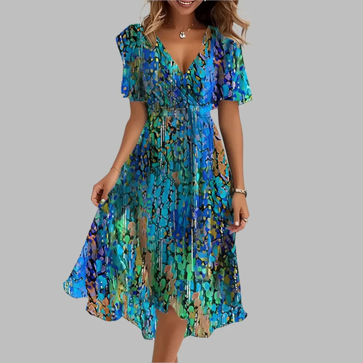 Elegant floral ruched midi dress with puff sleeves & sweetheart neckline. Perfect for summer/spring occasions.