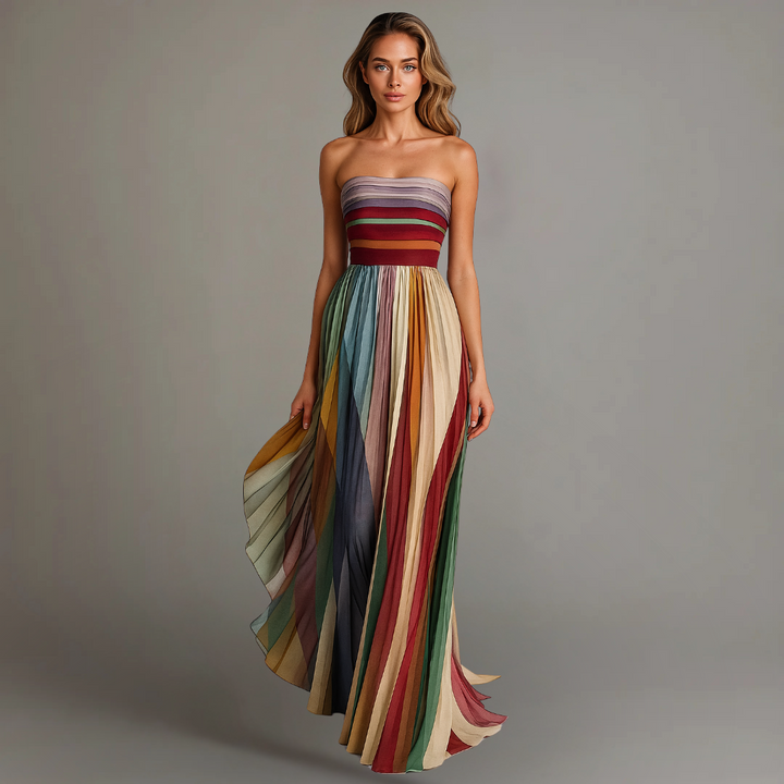 Elegant flowing women's strapless pleated maxi dress, perfect for summer events and vacation.