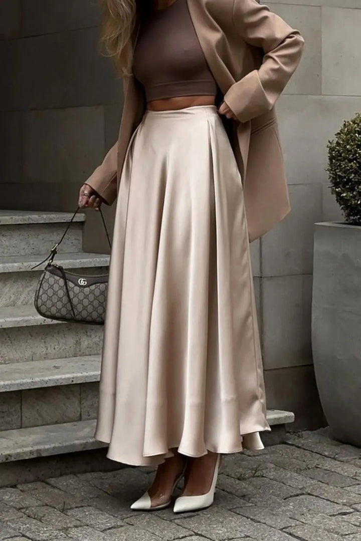 Women's elegant long maxi skirt, ideal for evening wear, wedding guests, or sophisticated office attire.
