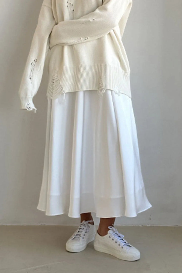 Women's long flowy maxi skirt with elegant draping, a must-have for chic and comfortable fashion.