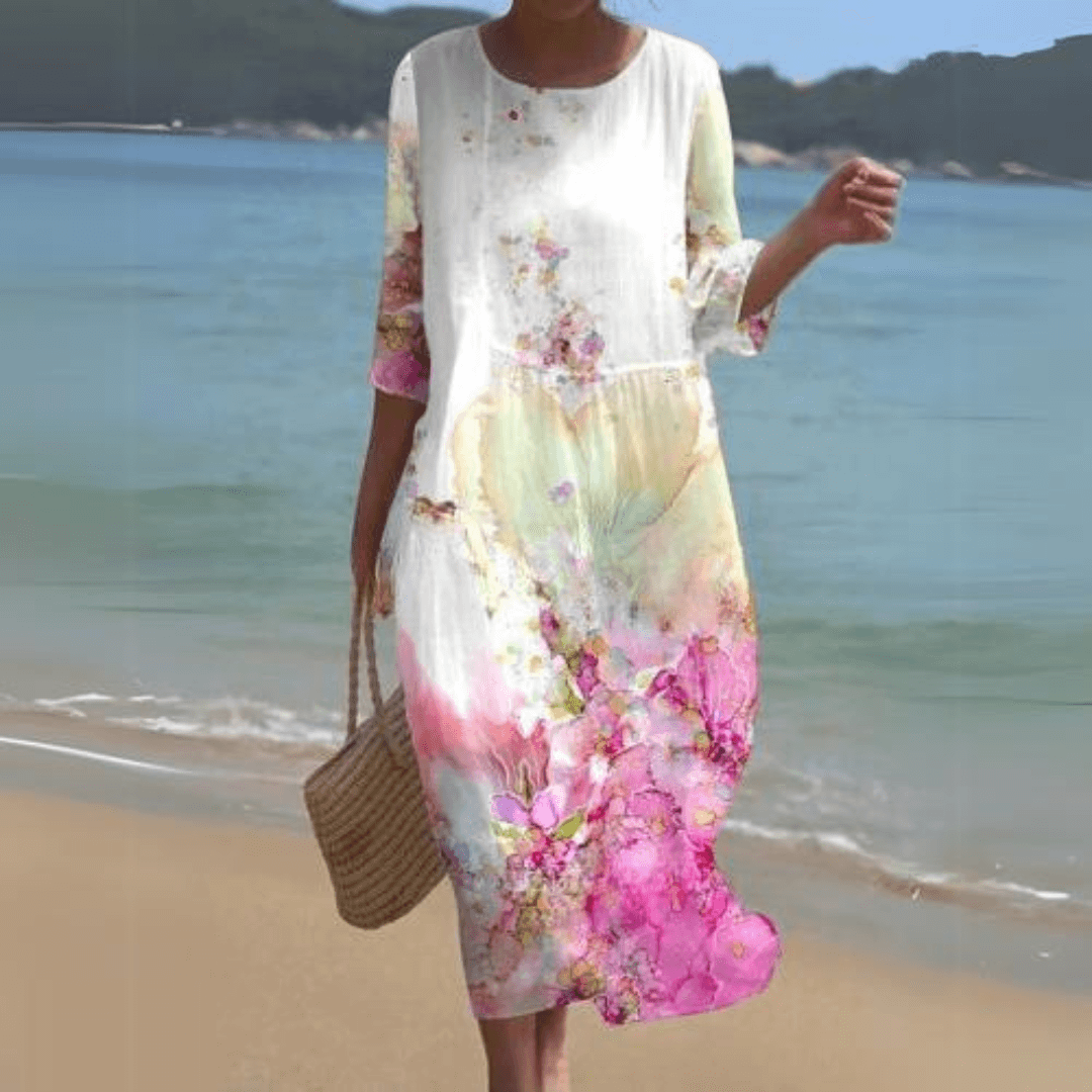 Elegant women's midi dress, designed with a flowy silhouette for ultimate summer comfort and style.