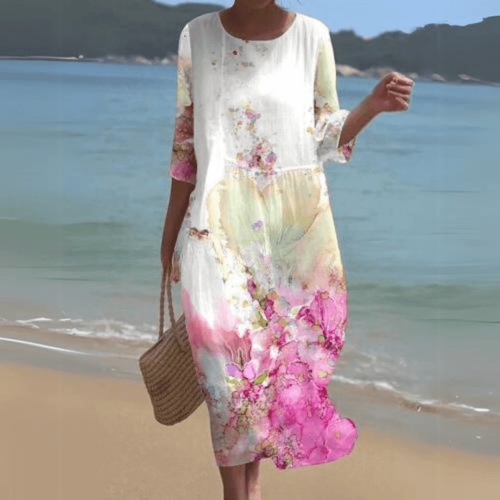 Elegant women's midi dress, designed with a flowy silhouette for ultimate summer comfort and style.
