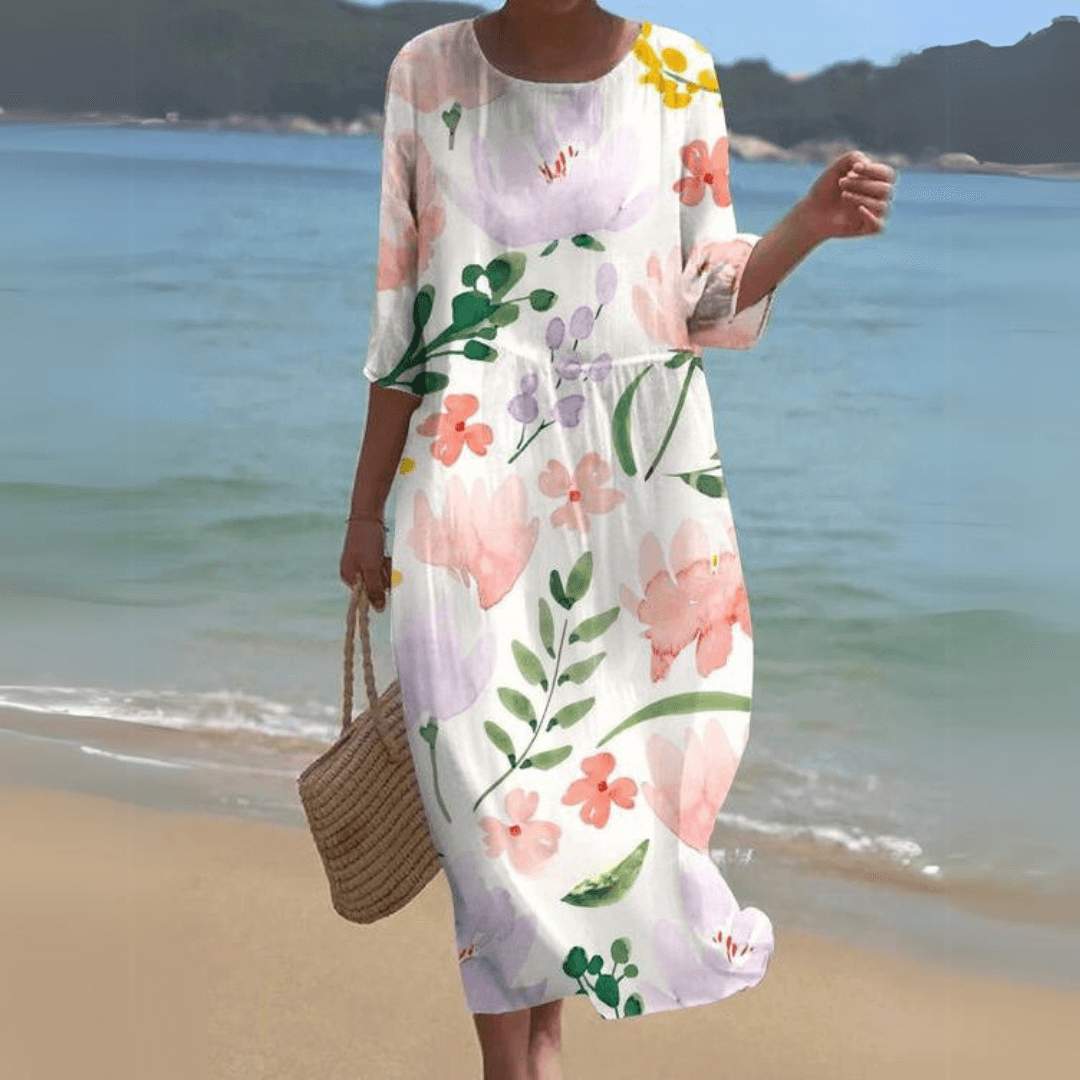 Women's versatile flowy midi dress, an elegant and comfortable choice for effortless summer fashion.