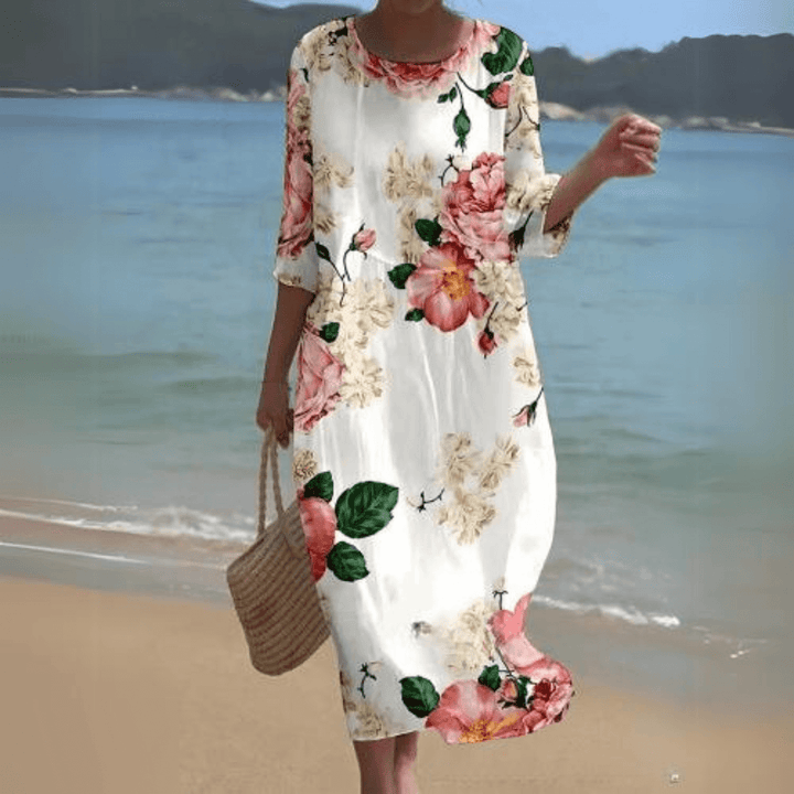 Beautiful women's elegant flowy midi dress, a perfect choice for sophisticated summer apparel.