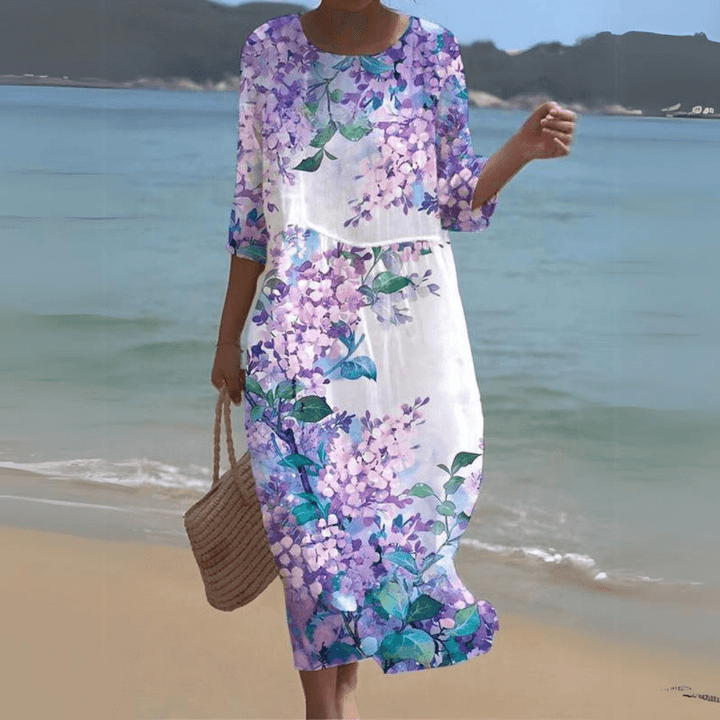 Graceful women's summer midi dress, a comfortable and elegant flowy design for versatile wear.