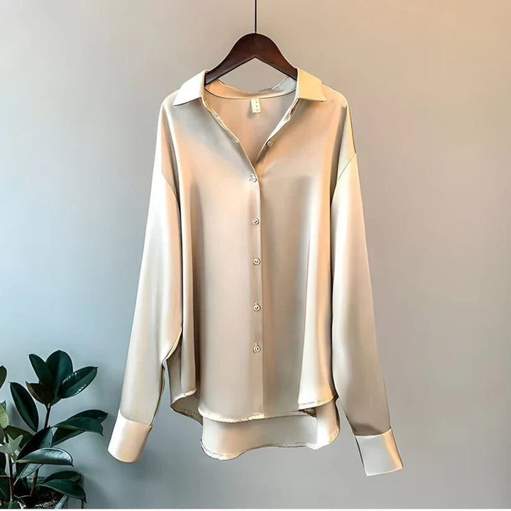 Versatile modern women's flowy blouse, elegant long sleeve top for all season sophisticated style.