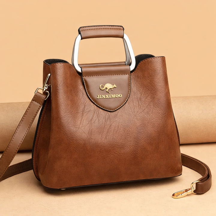 Versatile women's leather shoulder bag, stylish for everyday fashion, can be worn crossbody.