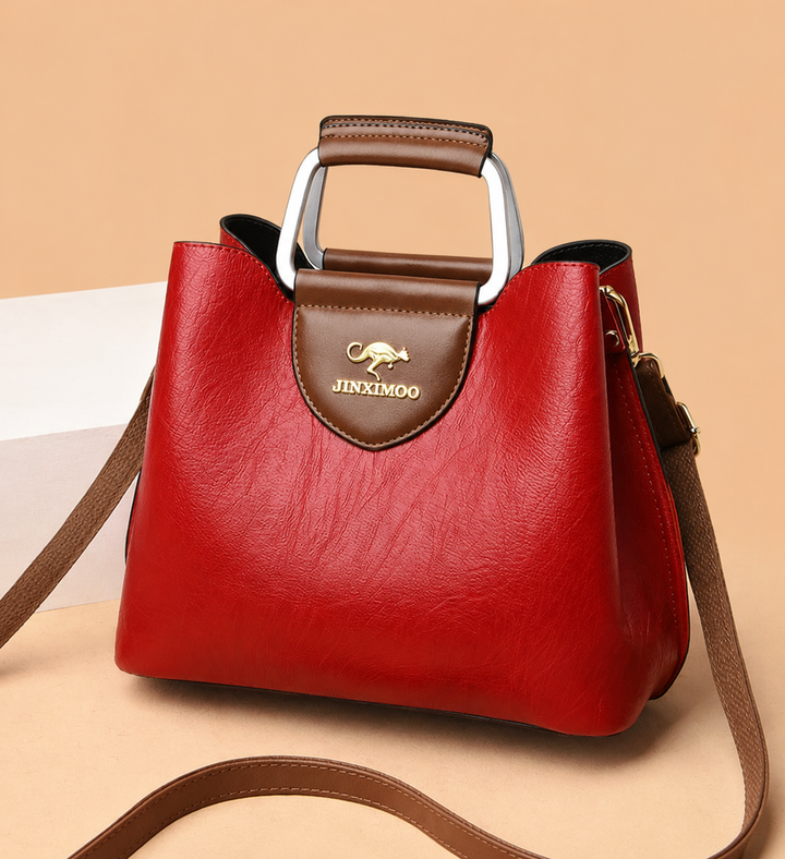 Chic women's leather shoulder bag, an elegant daily use handbag made from genuine leather.