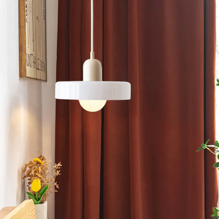 Sleek glass globe LED pendant, adjustable and elegant for any modern interior.