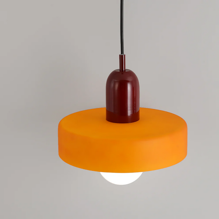 Adjustable elegant glass globe LED pendant for ambient modern home decor.