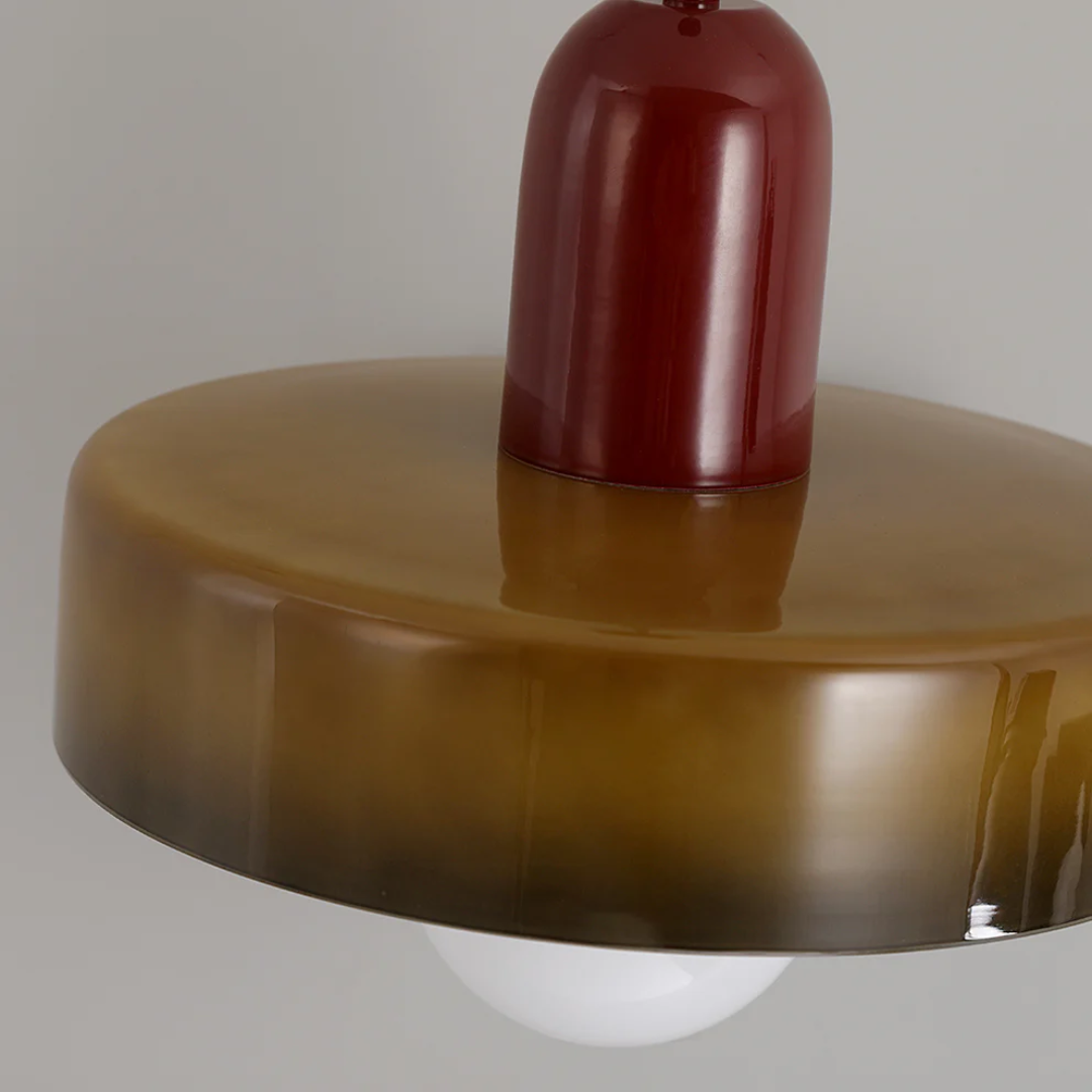 Designer glass globe LED ceiling lamp, providing elegant illumination to modern interiors.