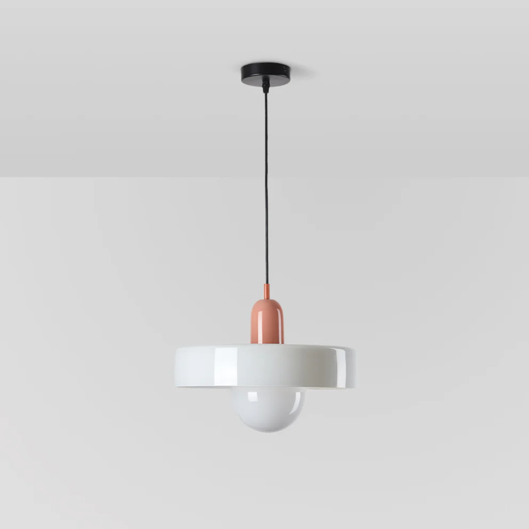 Designer LED pendant light with a clear glass globe, ideal for modern interiors.