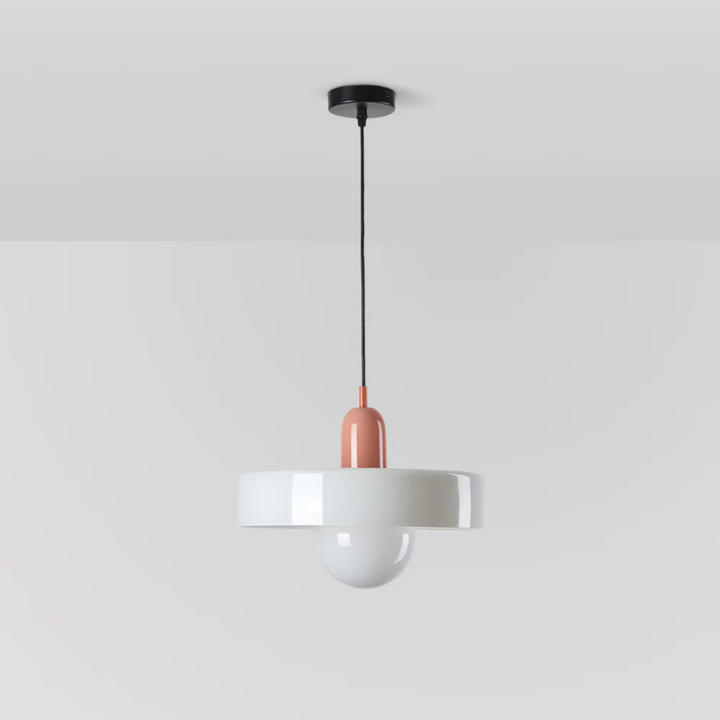 Designer LED pendant light with a clear glass globe, ideal for modern interiors.
