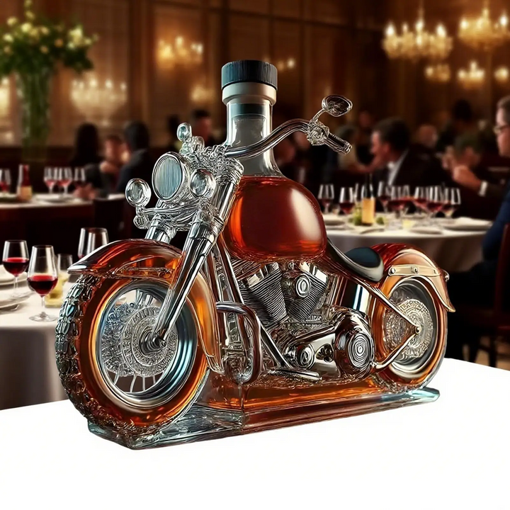 Hand-blown glass motorcycle whiskey decanter with stand, ideal for storing & serving spirits. Bar accessory.
