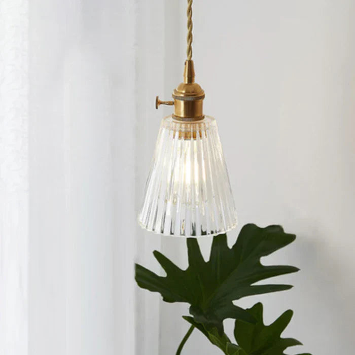 Modern elegant glass hanging light, single bulb, perfect for dining room decor & transparent design.