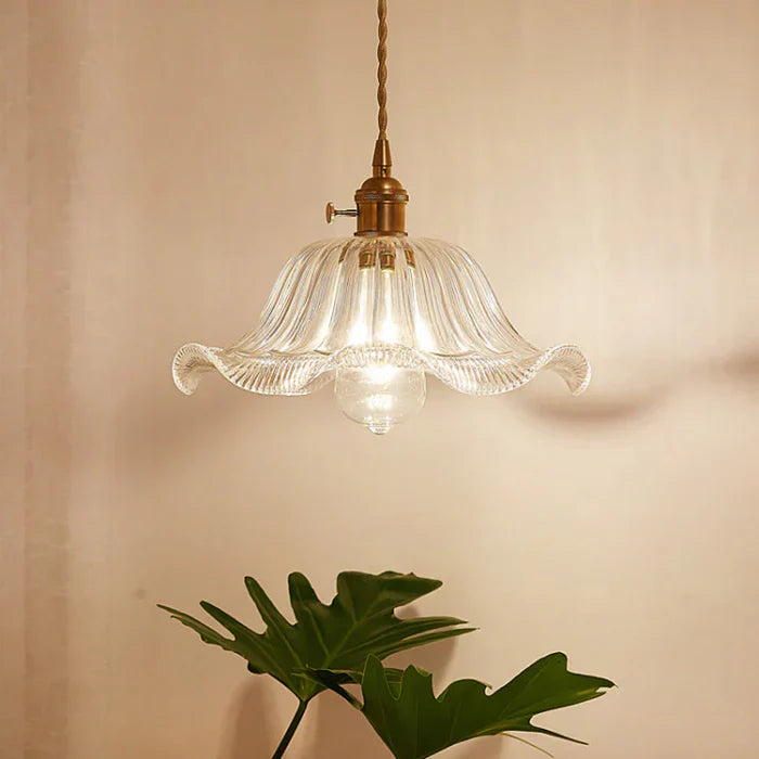 Clear glass pendant for dining room, stylish ceiling fixture, OpulentGlow elegant design.
