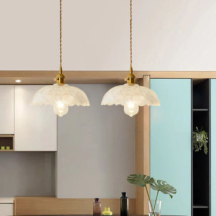 Elegant glass pendant lamp, modern dining room lighting, clear finish & ceiling fixture.