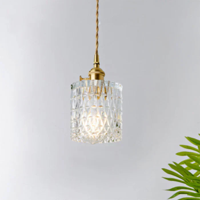Modern elegant glass pendant light, transparent design for dining room lighting, ceiling fixture.
