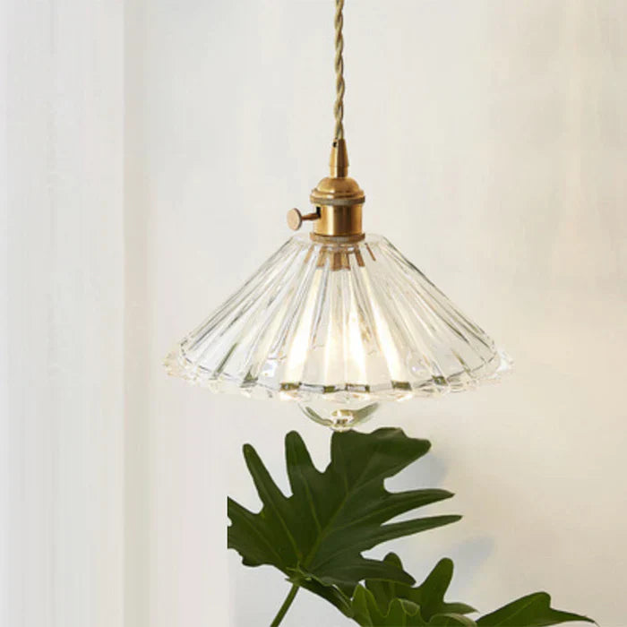 Clear glass ceiling pendant lamp, perfect hanging light for dining room or kitchen island, modern decor.