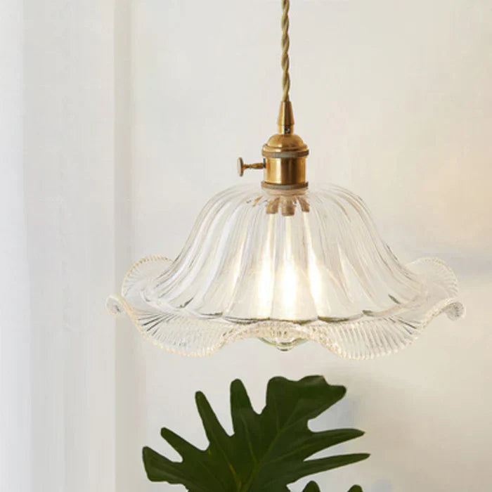 Stylish glass pendant lamp, single bulb fixture with elegant design for dining room & home lighting.