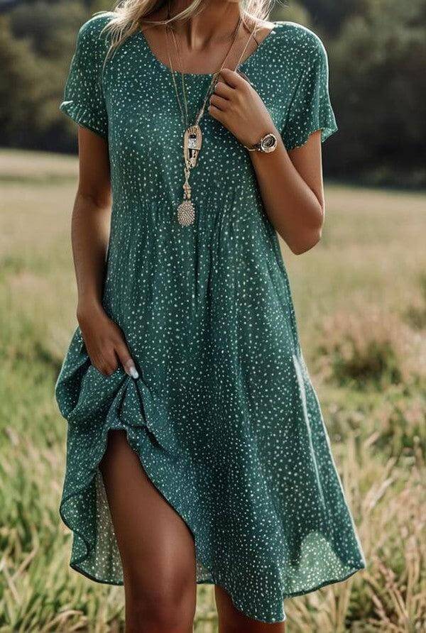 Elegant green V-neck summer dress for women. Stylish and lightweight, perfect for casual or dressed-up occasions.