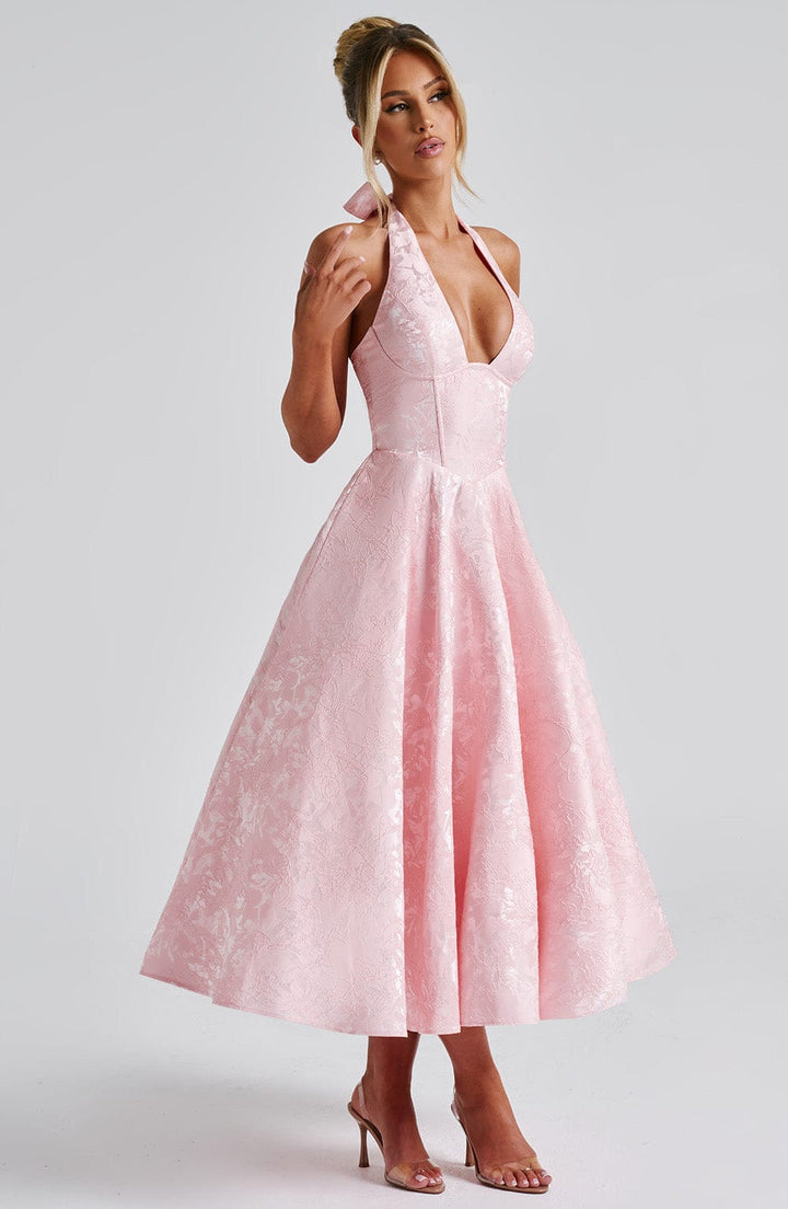Chic Pink Halter Midi Dress, ideal for parties, cocktails, or summer events.