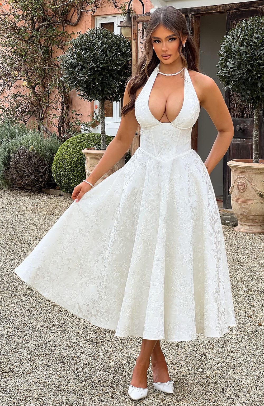Graceful White Halter Midi Dress, perfect for formal events, parties, or cocktails.