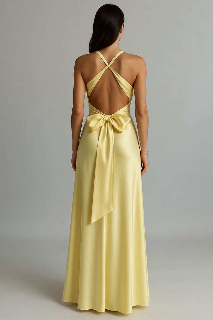Women's elegant halter maxi dress with twist front & open back, ideal for prom or formal occasions.