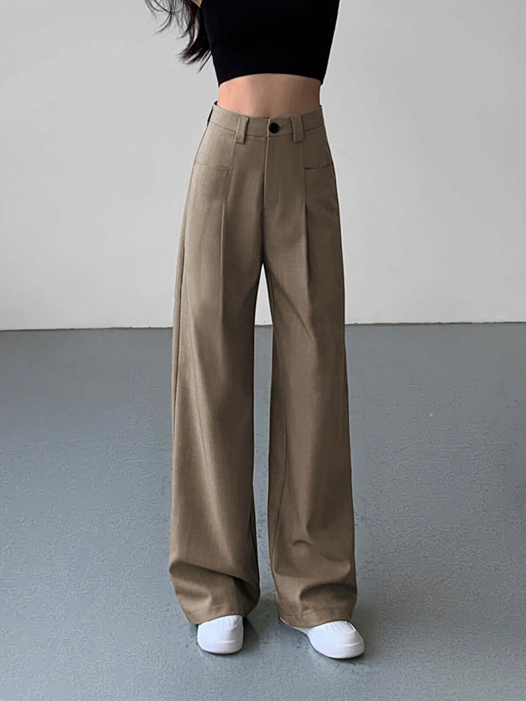 Flowing wide-leg high-waisted women's trousers with a flattering silhouette. Elegant & comfortable for daily wear.