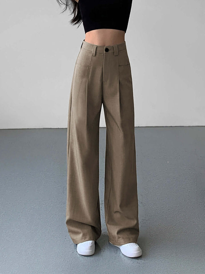 Flowing wide-leg high-waisted women's trousers with a flattering silhouette. Elegant & comfortable for daily wear.
