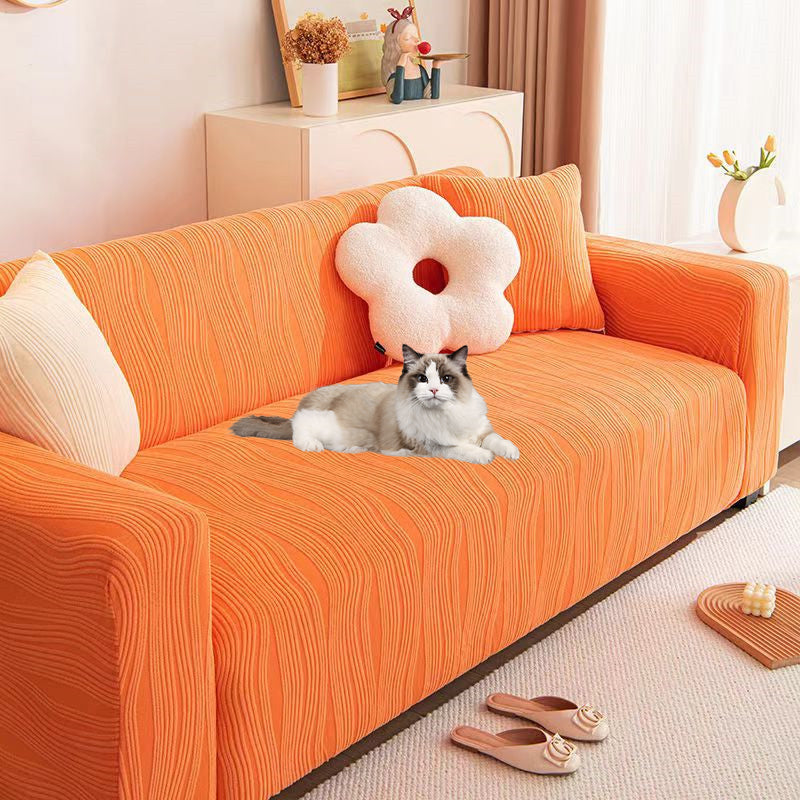 Elegant jacquard sofa cover with velvet texture, anti-scratch, stretchable and pet-friendly, ideal for stylish protection.