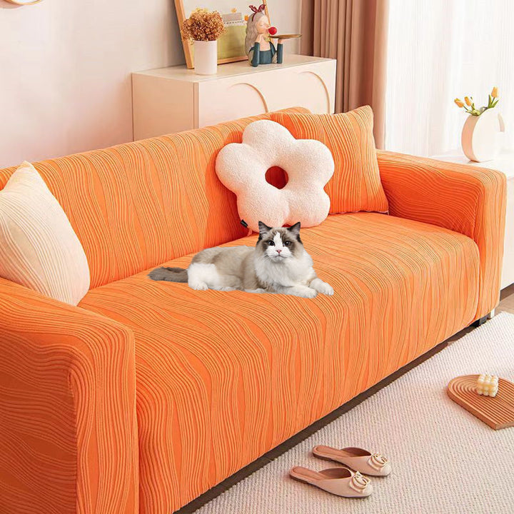 Elegant jacquard sofa cover with velvet texture, anti-scratch, stretchable and pet-friendly, ideal for stylish protection.