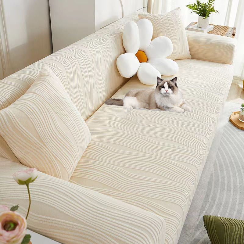 Elegant jacquard sofa cover with velvet texture, anti-scratch, stretchable and pet-friendly, ideal for stylish protection.