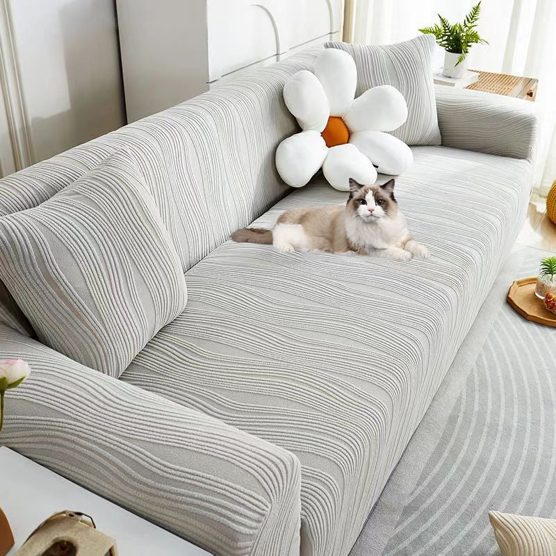 Elegant jacquard sofa cover with velvet texture, anti-scratch, stretchable and pet-friendly, ideal for stylish protection.
