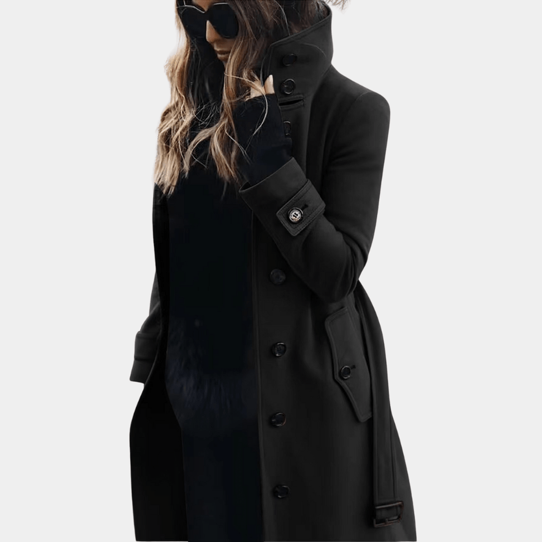 Sophisticated women's elegant dark grey trench coat, warm double-breasted outerwear, tailored for winter style.
