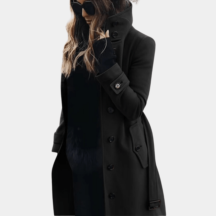 Sophisticated women's elegant dark grey trench coat, warm double-breasted outerwear, tailored for winter style.