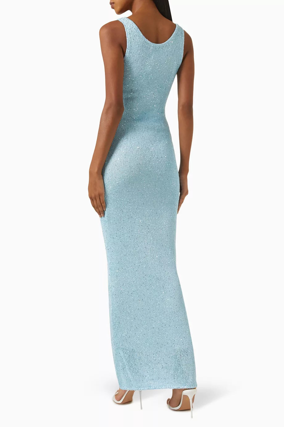 Women's glamorous light blue sequin maxi dress, a stunning formal evening gown with long, elegant design.