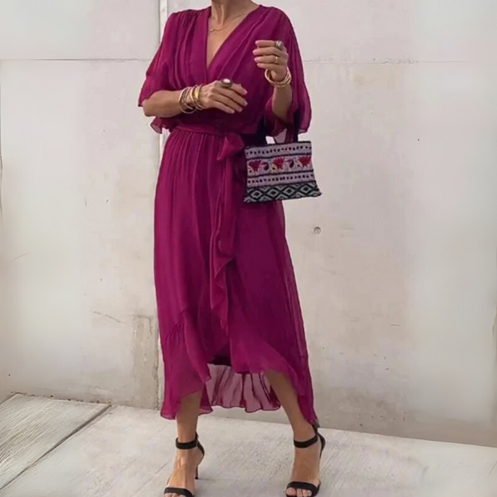 Casual women's summer wrap dress. Elegant lightweight midi, V-neck, adjustable fit. Perfect versatile fashion.