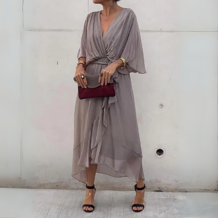 Versatile women's midi wrap dress, ideal for spring & summer. Lightweight fabric, elegant style, great for casual or chic.