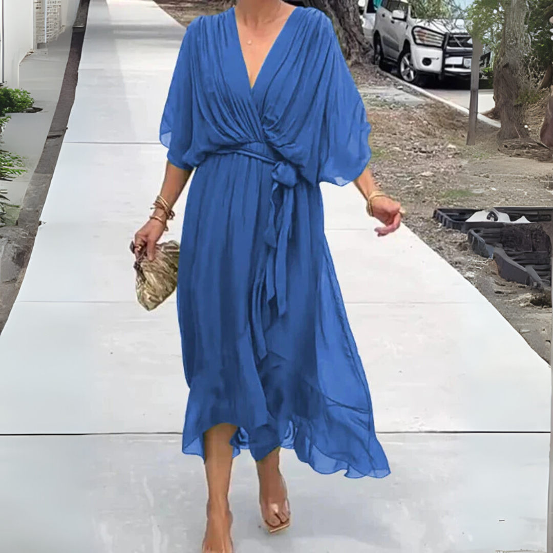 Women's elegant wrap dress, lightweight and breathable for summer. Ideal for brunch or office. Casual yet chic midi style.