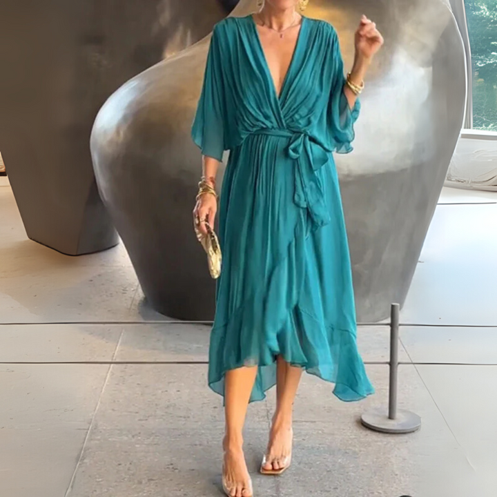 Elegant lightweight women's wrap dress, midi length. Perfect for summer & spring, V-neck and adjustable fit for style.