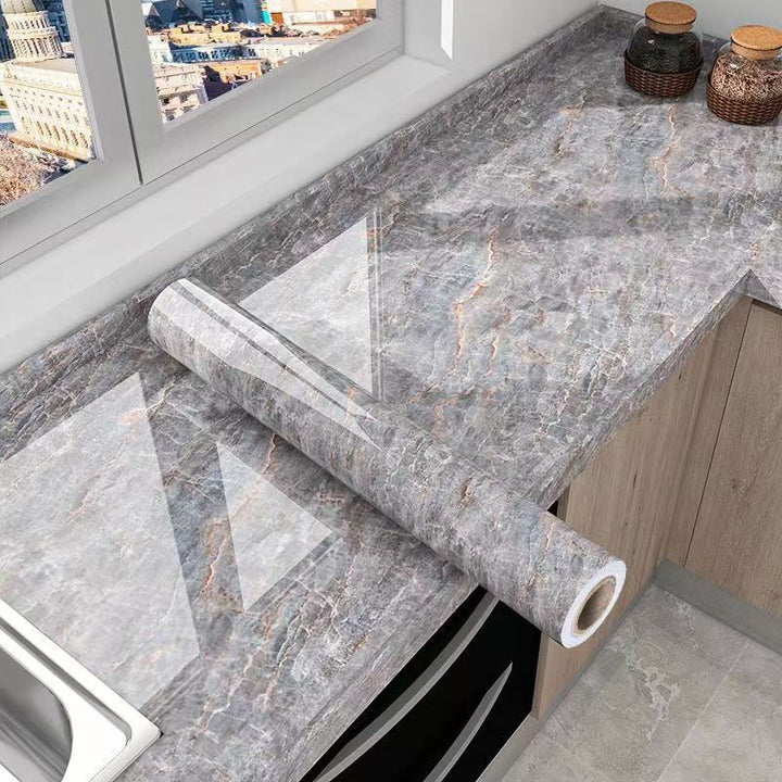 Decorative marble peel & stick contact paper, oil-resistant, protects kitchen walls & surfaces effectively.