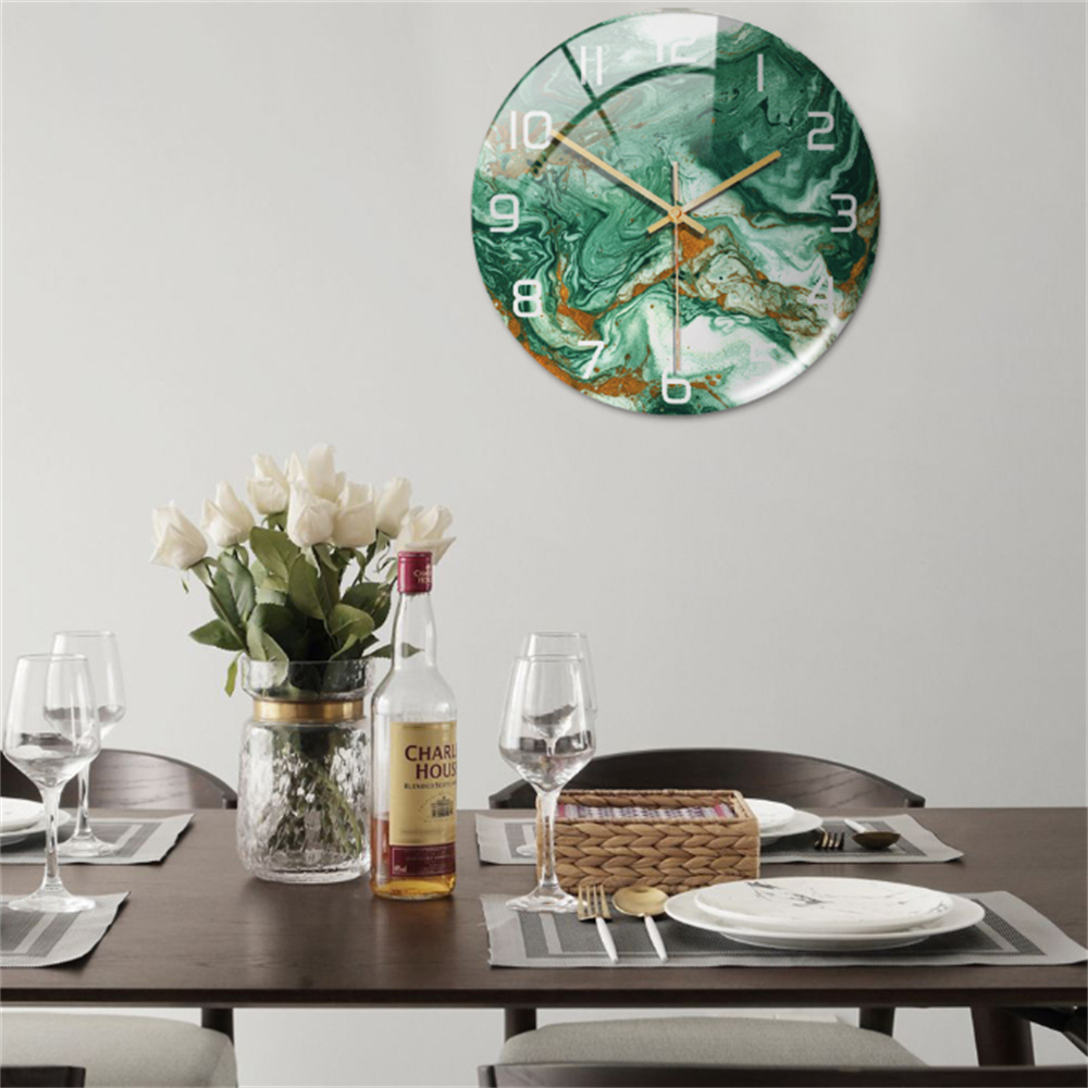 Elegant marble-style wall clock for modern home decor, perfect for living room.